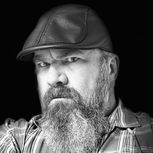 Customer pic in Flat Cap cropped image