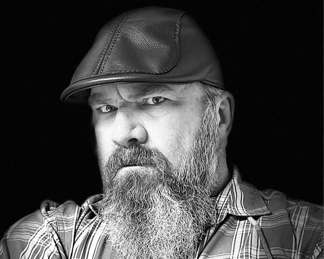 Customer pic in Flat Cap cropped image